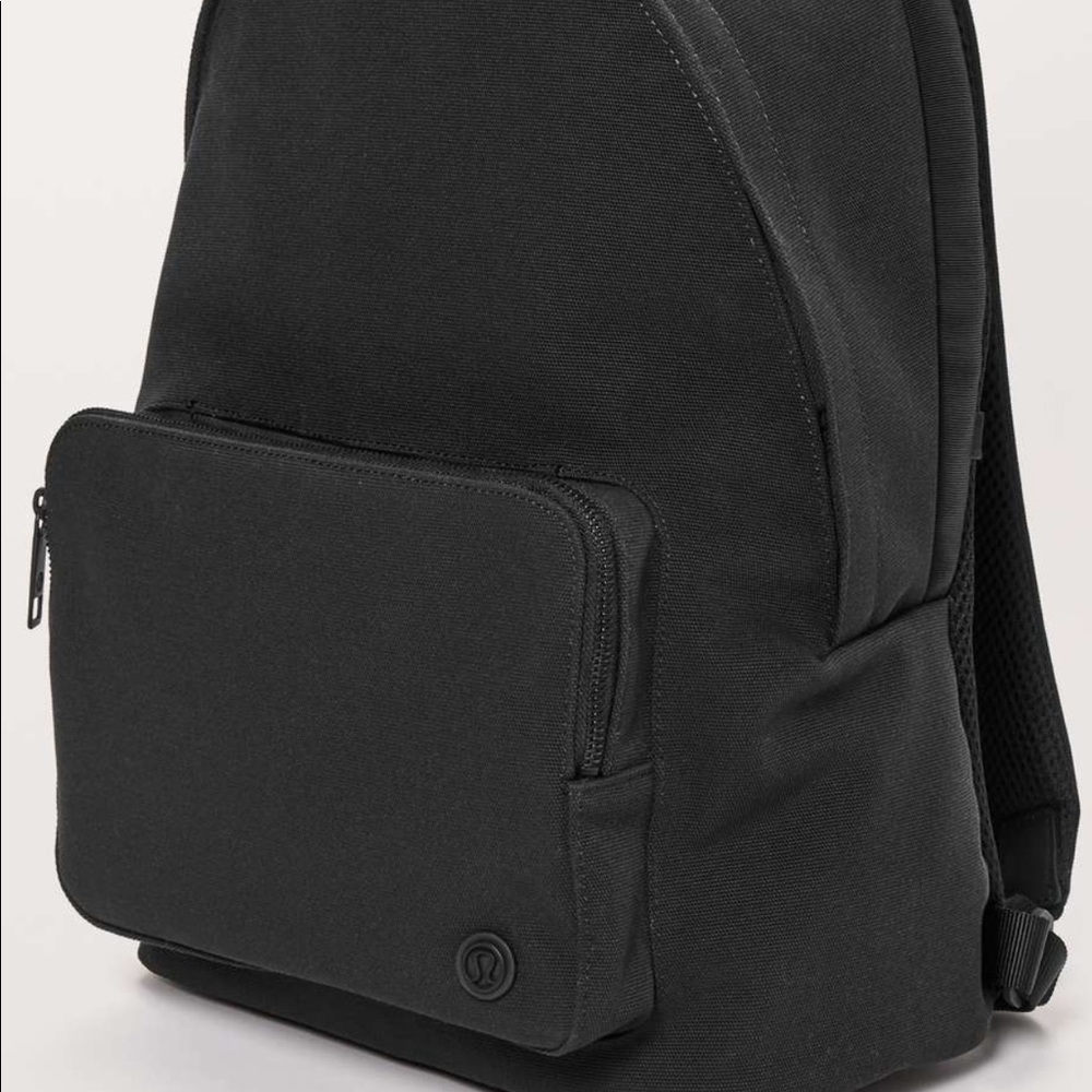 Lululemon everywhere black canvas backpack.
